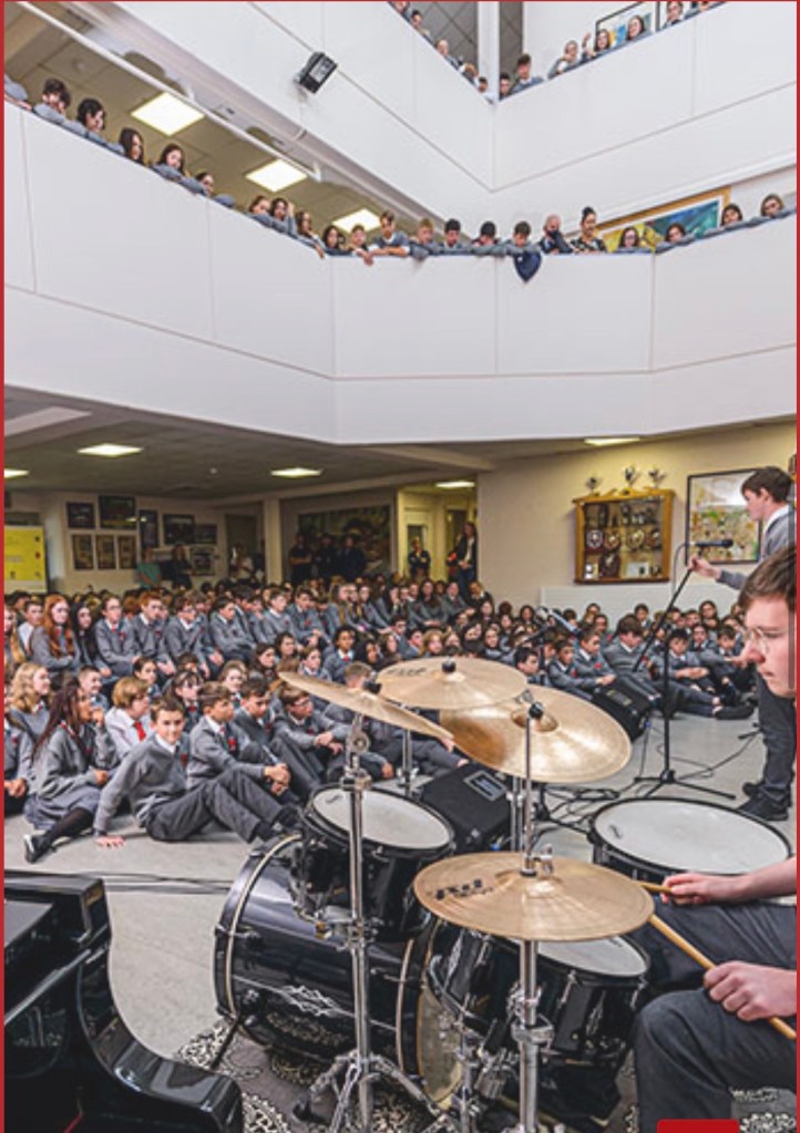Students gathered in the Well at the Intermediate School in Killorglin during a school performance.